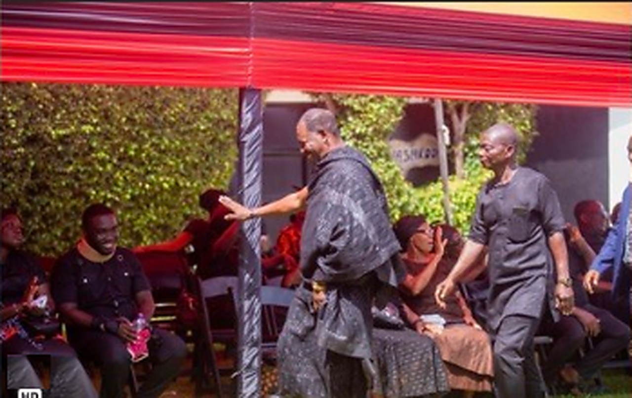 Family heads, dignitaries, and sympathizers arriving under the shaded canopy at Dreamz and Memoriez Events Garden, greeted by family elders.